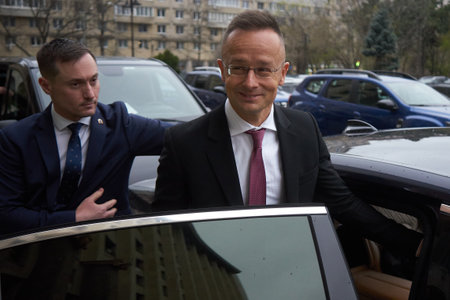 Bucharest, Romania. 4th Apr, 2023: Peter Szijjarto, The Minister of Foreign Affairs and Foreign Trade of Hungary, leaves after the signing ceremony of the agreement between the Government of Romania and the Government of Hungary regarding the establishmenのeditorial素材