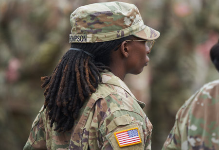 Bucharest, Romania. 5th Apr, 2023: American woman soldier of the 101st Airborne Division during the transfer of authority ceremony between the 101st Airborne Division (Air Assault) and the 10th Mountain Division, both of the US Army, at the Heroes of the のeditorial素材
