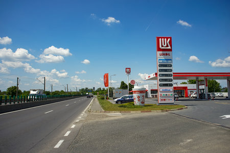 Tunari, Romania - Mai 24, 2023: A Lukoil gas station is seen on the Bucharest ring road (DMCB). This image is for editorial use only.のeditorial素材