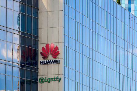 Bucharest, Romania - July 10, 2023: A logo of Huawei, Chinese telecommunications equipment company, is displayed on the top of a building, in Bucharest, Romania.のeditorial素材