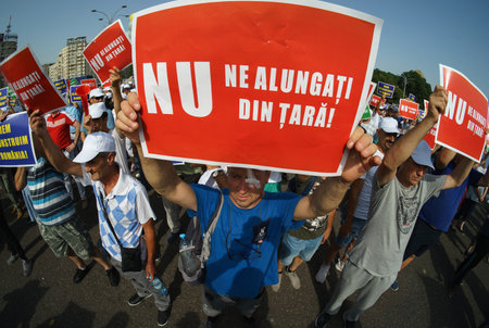 Bucharest, Romania - July 26, 2023: Up to 1,000 employees from the construction industry are protesting against government's intention to cut their fiscal facilities in front of Romanian Governmentのeditorial素材