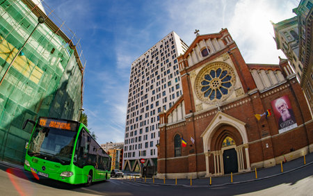 Bucharest, Romania - September 27, 2023: Cathedral Plaza Bucharest building finished in 2011 is still empty due to the trials regarding the legality of the construction near St Joseph's Cathedral.のeditorial素材