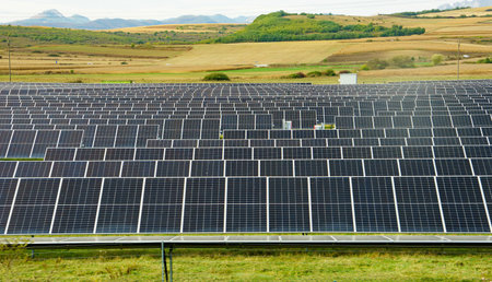 Teius, Romania - October 09, 2023: Photovoltaic solar panel field producing electricity near Teius in Alba County.のeditorial素材
