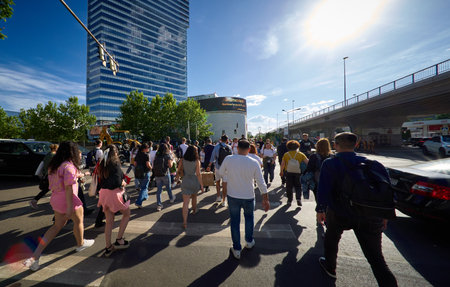 Bucharest, Romania - May 24, 2024: People are crossing the street in the northern office buildings area of Pipera neighborhood. This image is for editorial use only.のeditorial素材
