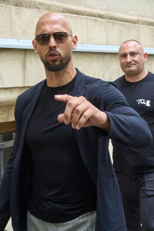 Bucharest, Romania. 30th May, 2024: Andrew Tate (L) and his brother Tristan Tate (not in picture) leave the Bucharest Court of Appeal.のeditorial素材