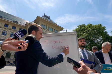 Bucharest, Romania. 16th May, 2024: Sebastian Burduja, Minister of Energy and the candidate of the National Liberal Party for the Mayor of Bucharest, holds a press conference in front of the General City Hall, about the financing of the pre-campaign and tのeditorial素材