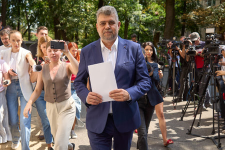Bucharest, Romania. 26th Aug, 2024: Marcel Ciolacu, president of Social Democratic Party (PSD) and Romanian prime minister, leaves after the meeting of the PSD National Political Bureau, at the party's headquarters in Bucharest.のeditorial素材