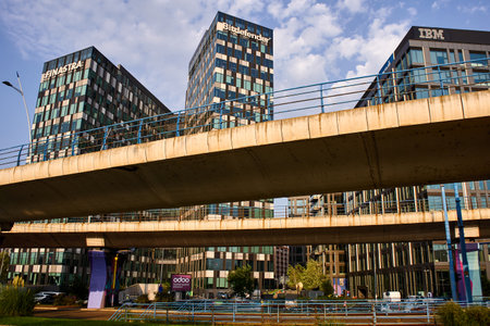 Bucharest, Romania - September 04, 2024: The logo of British financial technology company Finastra, Bitdefender and IBM are seen on top of their headquarters building in Bucharest.のeditorial素材