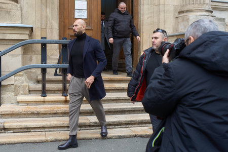 Bucharest, Romania. 30th Dec, 2024: Andrew Tate (L) leaves the Bucharest Court of Appeal. He appealed the measure of house arrest today.のeditorial素材