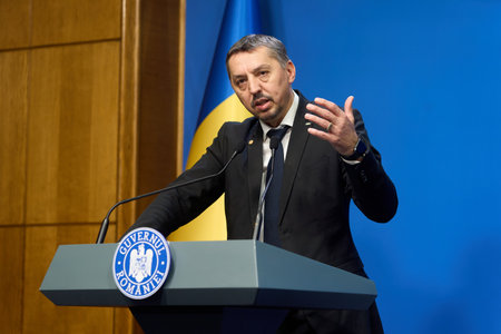 Bucharest, Romania. 28th Jan, 2025: Daniel David, the Romanian Minister of Education, speaks during the press briefing after the government meeting at the Victoria Palace, the Romanian Government headquarters.のeditorial素材