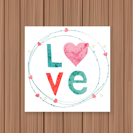 Love card on a wooden background. Can be used for invitations.のイラスト素材