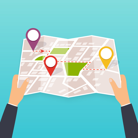 Hand holding a paper map with points. Tourist look at map of the city. Vector Illustration in flat design. Travel concept.のイラスト素材