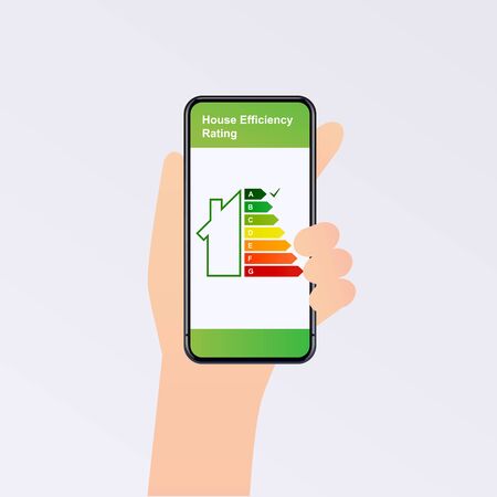 Hand holding phone with energy efficiency rating. Smart home. Flat design style vector illustration concept of smart house technology system with centralized control.のイラスト素材
