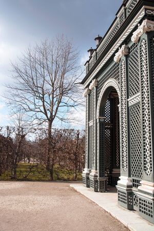 Vienna, Austria, March 2018. Old wooden gazebo in the garden of Sch0nbrunn Palace, the imperial summer residence of the Habsburg monarchs in early spring.のeditorial素材