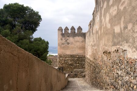 Malaga, Spain, February 2019.  The ancient stone walls of the Arab fortress Gibralfaro. Landmark of...