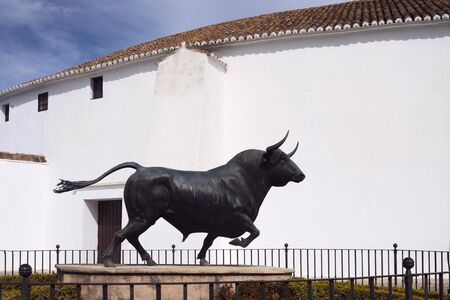 Ronda, Spain, February 2019. Monument to the bull at the main entrance to the circular arena of the Plaza de Toros, Ronda. Rhonda - the birthplace of Spanish bullfighting.のeditorial素材