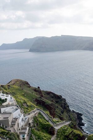 Beautiful island of Santorini, Greece. Traditional white greek houses against the backdrop of the...