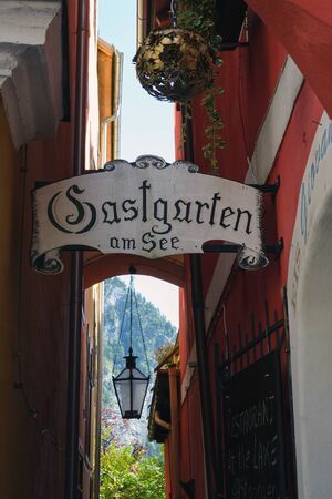 Hallstatt, Austria, September 2019. Famous mountain village in the Austrian Alps on a warm autumn...
