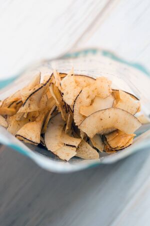 Delicious crispy coconut chips with salted caramel. Natural product made from coconut pulp. Useful...