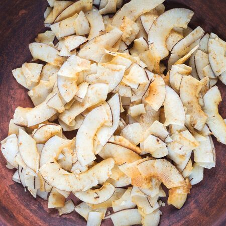 Delicious crispy coconut chips with salted caramel. Natural product made from coconut pulp. Useful...