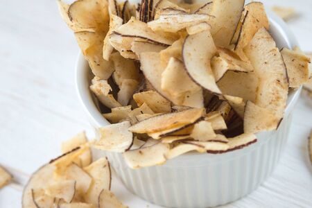 Delicious crispy coconut chips with salted caramel. Natural product made from coconut pulp. Useful...
