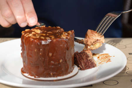 Delicious chocolate cake on the dining table. Dessert to finish off the dinner at the restaurant.