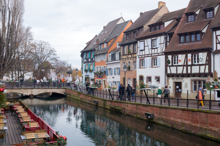 Colmar, France, Alsace, December 2021. The French city of Colmar on the eve of the Christmas holiday. Colorful medieval houses and a canal in the city.のeditorial素材