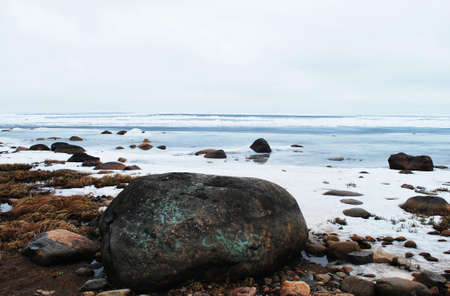 RUSSIA - APRIL 2012: Shore of frozen Ladoga Lake. Leningrad region, Russia.の写真素材