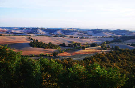 ITALY - SEPTEMBER 2011: Pictured is a typical Tuscan landscape. Photographed in the evening, at...