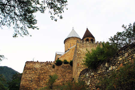 Georgia - September 2015: view of the Ananuri fortress. Georgian military road. Mainly cloudy.