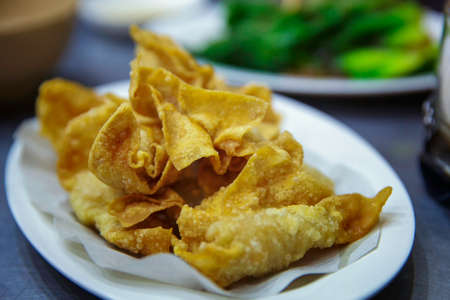 Fried shrimp with yellow shrimp on a white plate.の写真素材
