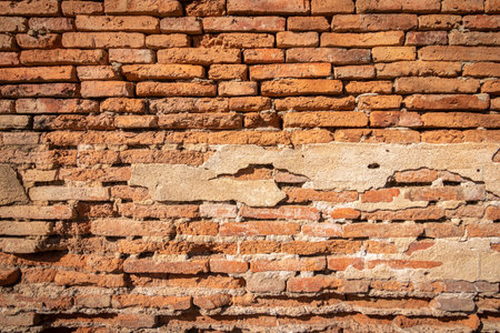 Old brick wall with stains. Dirty brick walls that are not plastered background and texture. Background of old vintage brick walls.の写真素材