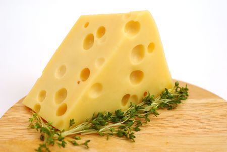 Piese of cheese on a white background