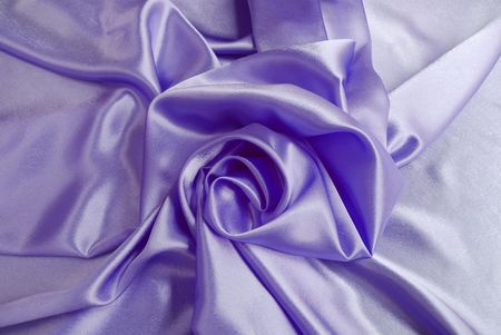 Violet satin with a foldsの写真素材