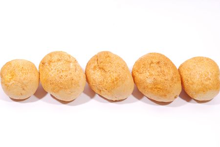 Five fresh buns over white backgroundの写真素材