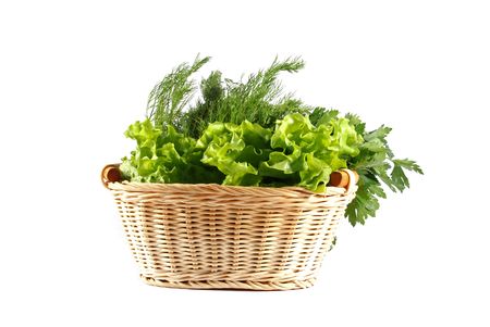 Parsley, dill and lettuce in basket on white backgroundの写真素材