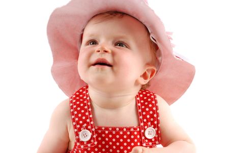 Portrait of little girl in red hatの写真素材
