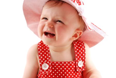 Portrait of little girl in red hatの写真素材