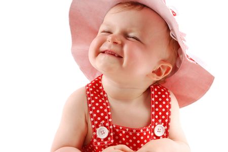 Portrait of little girl in red hatの写真素材