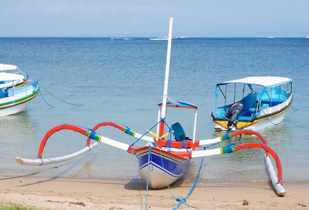 Very colorful traditional fishing boat in bali.の写真素材