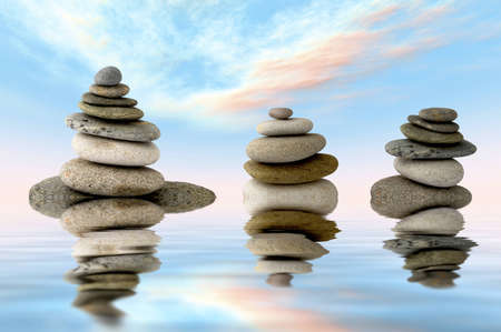 three piles of stones for zen balanceの写真素材