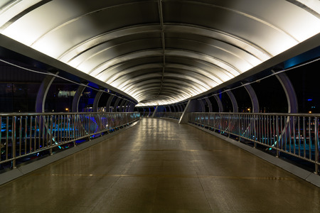 The curve walkway on the bridge in the city.の写真素材