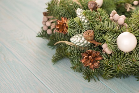 Christmas wreath on wooden blue backgroundの写真素材