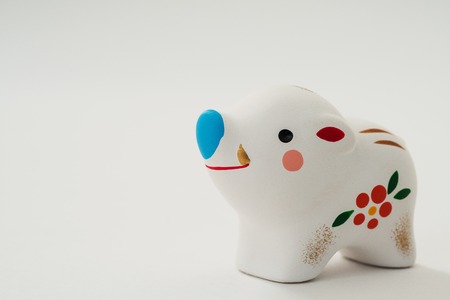 White clay piggy white background.with copy space.の写真素材