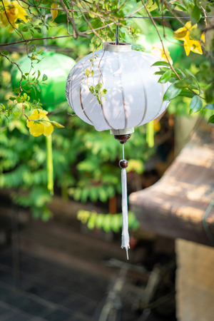 Beautiful white and green lanterns in soft and blur style in Hoi An, Vietnam.の写真素材