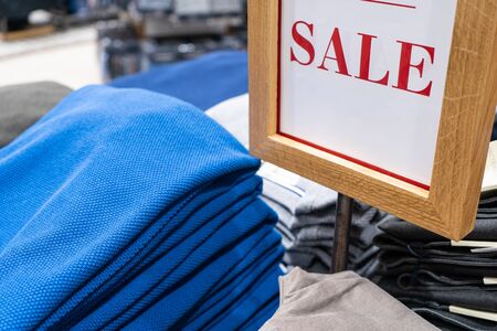 Sale sign in a mens clothing store.の写真素材