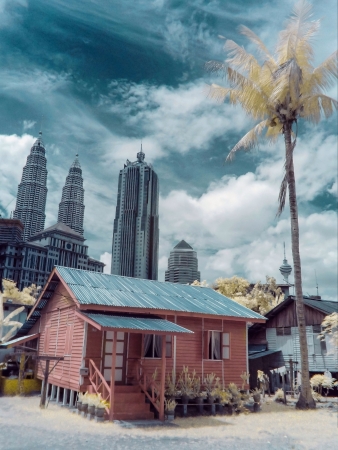 A traditional house with twin tower background located at Kampung Baru Kuala Lumpur Malaysia.の素材