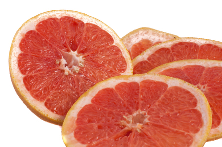 Fresh grapefruit rings set isolated on white background.の写真素材