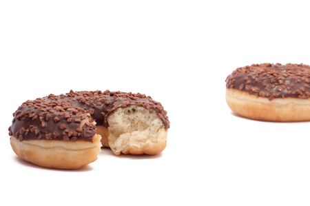 Two chocolate donut is broken half cut donut peachの写真素材
