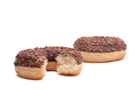 Two chocolate donut is broken half cut donut peachの写真素材